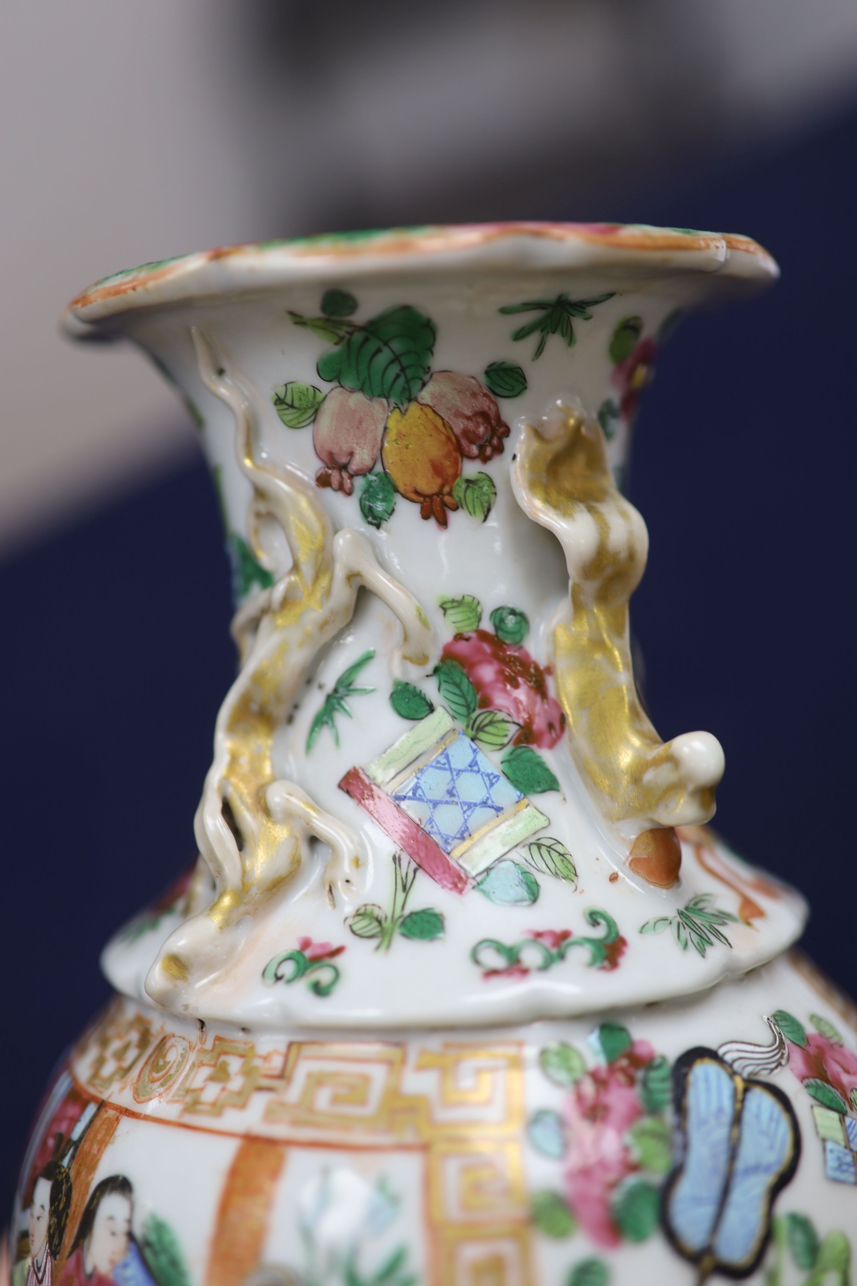 A Chinese famille verte jar and cover and a Canton famille rose vase, tallest 22cm